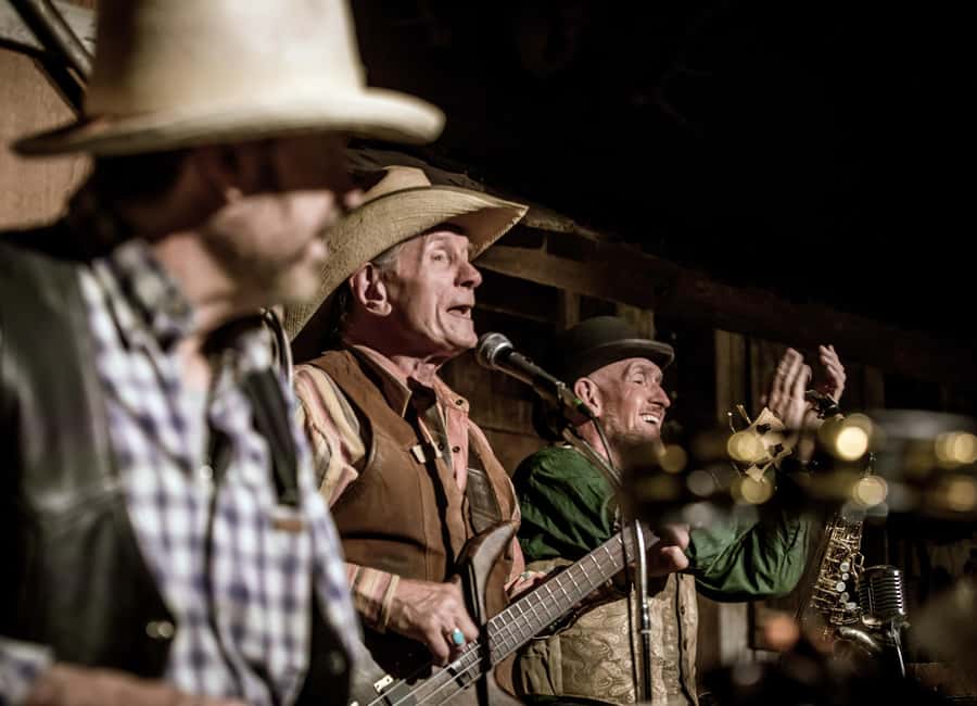 Sedona: Western Dinner Theater and Town Experience - 5:00 PM gates and hands-on games: axe, bull, shooting, and old-time photos
